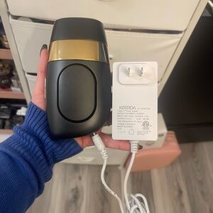 Black and Gold Hair Removal Device